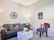 Inviting living room with comfortable seating, decorative accents, and a warm ambiance at 584 Aldenham Ln, Ormond Beach, FL 32174