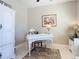 Bright office space with white desk at 584 Aldenham Ln, Ormond Beach, FL 32174
