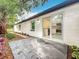 Home back patio showcasing an outdoor living space, perfect for entertaining at 748 Neuse Ave, Orlando, FL 32804