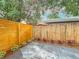 Fully fenced backyard with a patio is perfect for entertaining at 748 Neuse Ave, Orlando, FL 32804