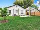 The backyard showcases a new patio and landscaping at 748 Neuse Ave, Orlando, FL 32804
