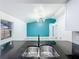 Spacious open floor plan featuring stainless steel appliances and granite countertops at 748 Neuse Ave, Orlando, FL 32804