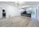 Spacious open floor plan with plenty of natural light with view to the kitchen at 748 Neuse Ave, Orlando, FL 32804