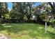 Large backyard with mature trees and plenty of room to enjoy the outdoors at 608 Grand St, Orlando, FL 32805