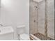 Bathroom features a tiled shower with modern fixtures and a vanity sink at 608 Grand St, Orlando, FL 32805
