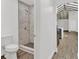 Bathroom view from hall featuring walk in shower and vanity at 608 Grand St, Orlando, FL 32805