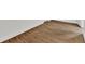 Close-up of the wood-look flooring, highlighting the natural texture and warm tones at 608 Grand St, Orlando, FL 32805