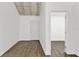 Bright living room boasts wood flooring and white walls, creating a modern and spacious feel at 608 Grand St, Orlando, FL 32805
