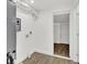 Utility Room featuring white walls and a light wood-look flooring at 608 Grand St, Orlando, FL 32805