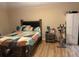 Relaxing bedroom featuring neutral tones, a comfortable bed, and a modern fan at 1136 Doncaster Ct, Kissimmee, FL 34758