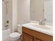 The bathroom has a wood vanity and a shower tub combo at 1086 Harmony Ln, Clermont, FL 34711
