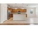 Modern kitchen with a functional center island, stainless appliances and ample cabinet space at 1086 Harmony Ln, Clermont, FL 34711