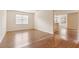Open floor plan showcasing a large living room with wood floor at 1086 Harmony Ln, Clermont, FL 34711