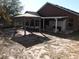 View of the backyard with gazebo and rear of home at 30126 Sandbunker Ln, Sorrento, FL 32776