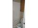 Bathroom featuring a standard toilet and storage at 30126 Sandbunker Ln, Sorrento, FL 32776