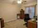 Bedroom featuring neutral walls, carpeted floors, and a ceiling fan at 30126 Sandbunker Ln, Sorrento, FL 32776