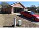 Attractive home with a driveway and garage, complemented by green space at 30126 Sandbunker Ln, Sorrento, FL 32776