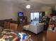 Comfortable living room with sliding glass door access to screened in patio at 30126 Sandbunker Ln, Sorrento, FL 32776