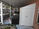 Covered patio with storage at 30126 Sandbunker Ln, Sorrento, FL 32776