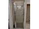 Bathroom shower with glass doors and tiled walls at 30126 Sandbunker Ln, Sorrento, FL 32776