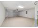 Spacious two car garage with epoxy flooring and overhead door with electric opener at 20184 Sw 57 St, Dunnellon, FL 34431