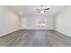 Bright and airy living area with neutral walls and modern flooring offers a blank canvas for personalization at 20184 Sw 57 St, Dunnellon, FL 34431