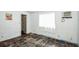 Bedroom view highlighting natural light, AC unit, and possible renovation project at 2486 Daytona Park Rd, Deland, FL 32724