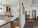 Comfortable living area featuring dining area and galley kitchen at 2486 Daytona Park Rd, Deland, FL 32724