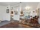 Comfortable living area featuring dining area and galley kitchen at 2486 Daytona Park Rd, Deland, FL 32724