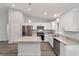 Bright, modern kitchen boasting granite countertops, stainless steel appliances, and ample cabinet space at 15673 Sw 37 Cir, Ocala, FL 34482