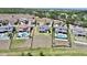 Aerial view of houses with pools and lush landscaping at 16832 Bolsena Dr, Bella Collina, FL 34756