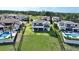 Aerial view of a spacious backyard and patio with ample room for outdoor entertaining at 16832 Bolsena Dr, Bella Collina, FL 34756