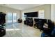 Home office with computer setup and lake view at 16832 Bolsena Dr, Bella Collina, FL 34756