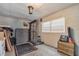 Basement space with a concrete floor, window, and storage at 1630 Lakeview Ct, Eustis, FL 32726