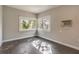 Corner bedroom showcasing natural lighting through the windows at 1630 Lakeview Ct, Eustis, FL 32726