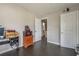 Spacious bedroom with an open doorway view of the ensuite bathroom at 1630 Lakeview Ct, Eustis, FL 32726