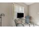 Office area features natural light, window, glass table and gray paint at 1630 Lakeview Ct, Eustis, FL 32726