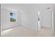 Bright bedroom featuring light wood floors, fresh paint, and natural light at 1132 Avenue K # A, Haines City, FL 33844
