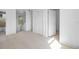 Neutral bedroom featuring light wood floors, fresh paint, and ample lighting at 1132 Avenue K # A, Haines City, FL 33844