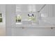 Bright kitchen features white cabinets, a center island, and elegant countertops at 1132 Avenue K # A, Haines City, FL 33844