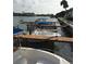 Boat dock featuring multiple boats and slips along the waterfront in a residential area at 335 N Causeway # E3, New Smyrna Beach, FL 32169