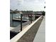 Modern boat dock with well-maintained wooden structures and convenient waterfront access at 335 N Causeway # E3, New Smyrna Beach, FL 32169