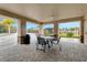 Outdoor gathering area featuring comfortable seating near pool and playground at 2549 Penguin Blvd, Davenport, FL 33837