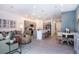 Expansive open floor plan showcases a modern kitchen, dining area, and a cozy living space for Gathering enjoyment at 2549 Penguin Blvd, Davenport, FL 33837