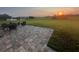 Brick patio set on a large lot overlooks a beautiful countryside at 3345 Tesoro Cir, New Smyrna Beach, FL 32168