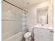 Bathroom with shower/tub combo and single sink vanity at 6677 Sw 81St Loop, Ocala, FL 34476