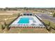 Community pool with lounge chairs and covered area for residents' enjoyment at 6677 Sw 81St Loop, Ocala, FL 34476