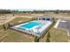 Community pool area, complete with ample seating and a covered pavilion at 6677 Sw 81St Loop, Ocala, FL 34476