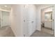 Hallway with closet and bathroom view at 6677 Sw 81St Loop, Ocala, FL 34476