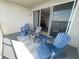 Inviting balcony with comfortable seating, perfect for relaxing and enjoying the outdoors at 13415 Blue Heron Beach Dr # 1407, Orlando, FL 32821